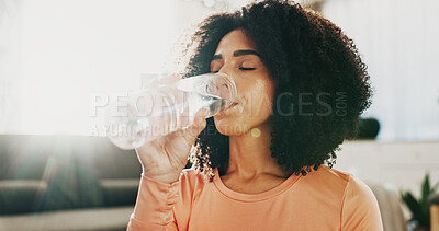 Buy stock photo Tired, woman and drinking water for fitness at house for hydration, refreshing liquid and break. Female person, rest and thirsty with healthy beverage, gut health and exercise recovery for wellness