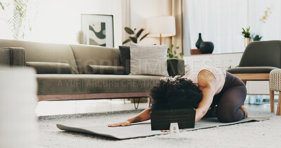 Buy stock photo Woman, yoga mat and tablet in home for stretching, tutorial or online course for childs pose on floor. Person, smile and tech for virtual class, fitness or streaming subscription on app at apartment