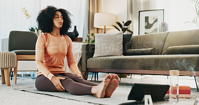 Buy stock photo Woman, yoga mat and tablet in home for wellness, tutorial or online course for holistic fitness on floor. Person, tech and virtual class for breathing exercise, streaming subscription or app at house