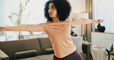 Buy stock photo Yoga, fitness and woman in home for stretching, balance or exercise for wellness in morning. Health, challenge and female person in warrior pose for muscles for chakra in living room at apartment.