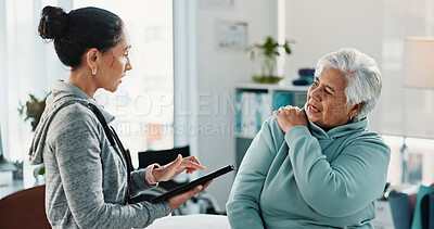 Buy stock photo Old woman, physiotherapist and tablet with shoulder pain at clinic in consultation, explain and injury. People, healthcare professional and tech with notes, discussion and rehabilitation for recovery