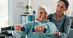 Old woman, physiotherapist and support with dumbbells at clinic for exercise, happy or recovery for injury. People, healthcare professional and tech with help, strength training and rehabilitation