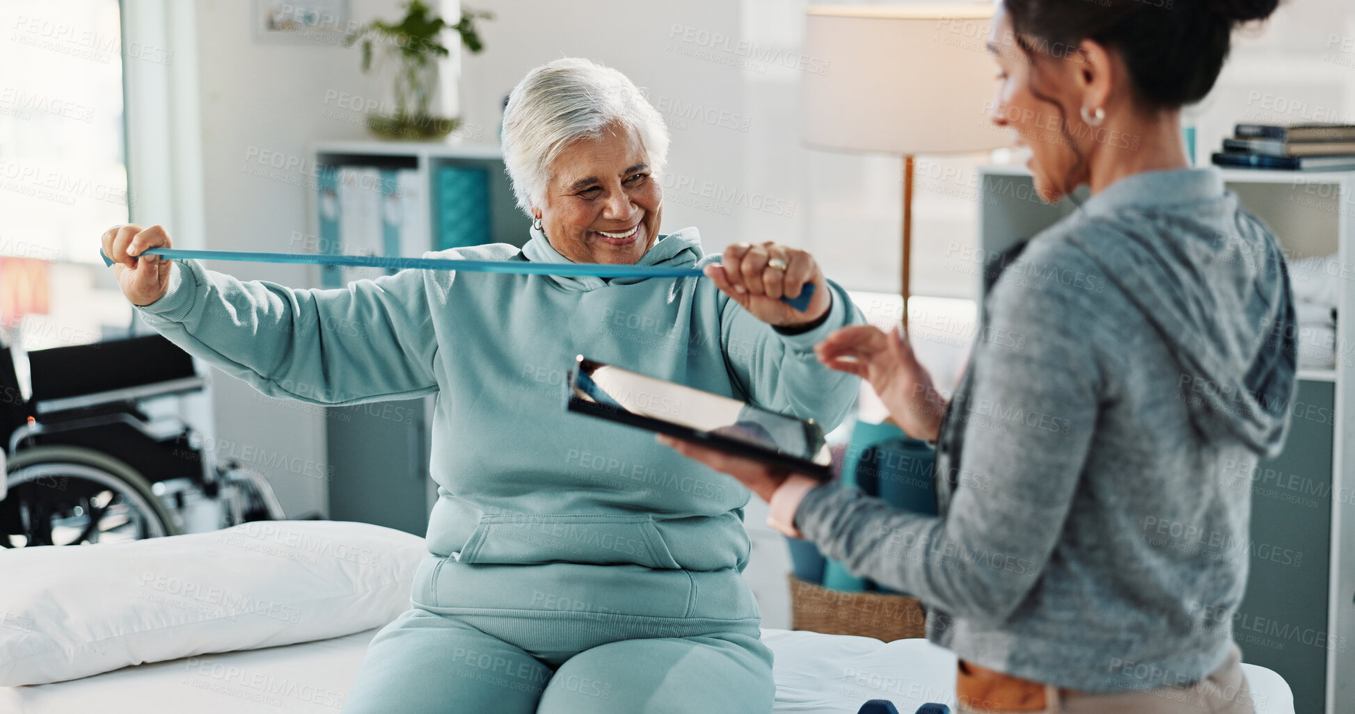 Buy stock photo Woman, physiotherapist and resistance band with tablet for progress, report and stats for recovery. People, mature patient with a disability and exercise for injury, rehabilitation and app at clinic