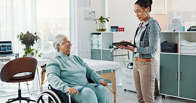 Buy stock photo Physiotherapist, tablet and old woman in clinic with wheelchair, discussion or good news for healing. Healthcare worker, tech and senior person with disability, smile or feedback for physical therapy
