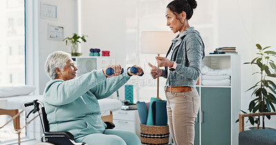Buy stock photo Old woman, physiotherapist and wheelchair for dumbbells at clinic for exercise, support or recovery for injury. Person with disability, healthcare and smile for motivation, counting or rehabilitation