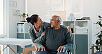 Physiotherapist, support and old man in clinic with wheelchair, checkup and wellness for recovery. Happy, healthcare worker and elderly person with disability, healing and help for physical therapy.
