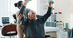 Man, physiotherapist and weights with help for progress, medical service for recovery. People, mature patient with a disability and dumbbell exercise for injury, rehabilitation and gear at clinic