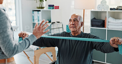 Buy stock photo Man, physiotherapist and stretching with discussion for progress, medical service and recovery. People, mature patient and woman with exercise for injury, rehabilitation and resistance band at clinic