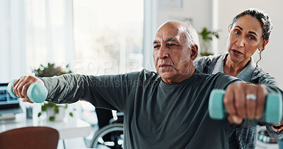 Buy stock photo Man, physiotherapist and weights with exercise for progress, medical service for recovery. People, mature patient with a disability and dumbbell help for injury, rehabilitation and gear at clinic