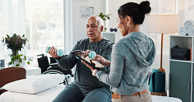 Buy stock photo Man, physiotherapist and weights with tablet for progress, medical service and recovery. People, mature patient with a disability and dumbbell exercise for injury, rehabilitation and app at clinic