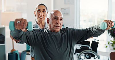Buy stock photo Man, physiotherapist and dumbbell with discussion for progress, medical service or recovery. People, mature patient with a disability and weight exercise for injury, rehabilitation and gear at clinic