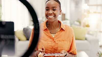 Buy stock photo Happy woman, influencer and makeup tutorial on phone, ring light or talking with audience on website. Content creation, mobile and black person with eyeshadow palette, social media and video in home