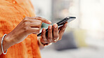 Hands, phone and woman in home, internet for social media and digital app for communication. Mobile user, apartment and person in living room, connection and message to contact and online chatting