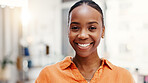 Black woman, happy and portrait in office with confidence, pride and career in hallway at company. African person, smile and job at creative agency, corridor and space at workplace in Nigeria