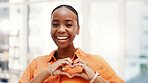 Portrait, heart hands and black woman in home, smile and care for charity, kindness and excited. Apartment, gesture and African person in living room, symbol for love and finger shape with thank you