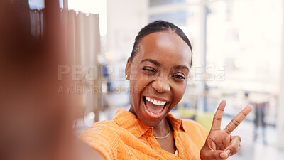 Buy stock photo Happy woman, portrait and wink for selfie in home, online and peace sign for picture on social media. Influencer, photography and black person with smile for image, laugh and goofy memory on website