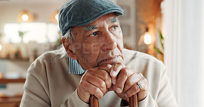 Buy stock photo Sad, thinking and old man in home with walking stick, Alzheimer disease and memory loss for retirement. Cane, reflection and senior person with disability, worry and loneliness from dementia illness.