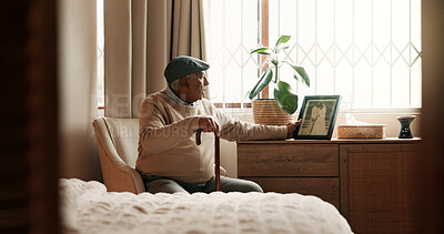Buy stock photo Grief, frame or old man in bedroom with walking stick, mourning or memory of past marriage. Mental health, reflection or senior in home person with disability, nostalgia or partner loss in retirement