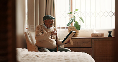 Buy stock photo Grief, photo or old man in house with walking stick, mourning or memory of past marriage. Mental health, picture frame or senior person with disability, nostalgia or partner loss in retirement.
