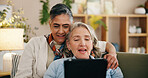 Tablet, mature and lesbian couple in home with conversation, movie and bonding together on weekend. Happy, lgbt people and relax in living room with tech, relationship and discussion for film choice.