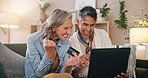 Lesbian couple, excited women and laptop with credit card, retirement or holiday planning in home. Mature, LGBTQ people and celebration with website, payment and savings for online discount or promo