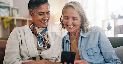 Buy stock photo Friends, cellphone and old women in home, funny meme and digital app for communication. Pensioner, smile and senior people on sofa, relax or smartphone for website info, connection or online joke