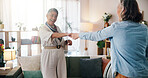 Dancing, happy and senior women in home with music, radio or playlist for bonding together. Smile, groove and elderly female friends in retirement with rhythm to song in living room at apartment. 
