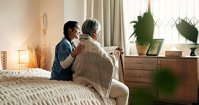 Buy stock photo Caregiver, support and old woman in nursing home with walking stick, relax and bonding together on bed. Nurse, help and elderly person with disability, cane and rehabilitation in retirement center.