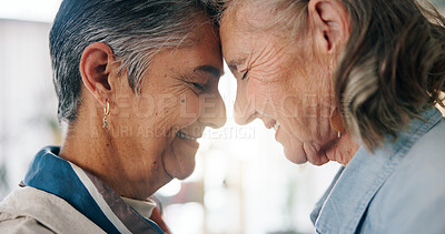 Buy stock photo Lesbian, forehead touch or couple in home with love, commitment or bonding together on weekend break. LGBTQ, flare or mature women with smile, connection or romantic moment in healthy relationship.