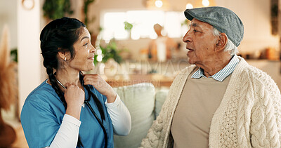 Buy stock photo Doctor, consultation and old man in home with discussion, stethoscope or explain symptoms of disease. Healthcare worker, senior person and cardiology equipment for house visit, conversation and help.