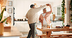 Dancing, smile and senior couple in kitchen, romance and retirement fun for anniversary celebration. Home, bonding and elderly people with support for healthy relationship, marriage or music for spin