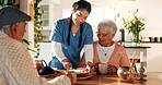 Happy, caregiver and old couple with cake at house for good news, celebration and treatment success. Smile, nurse and senior people with dessert for tea time, assisted living and healthcare milestone