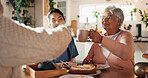 Caregiver, old couple and cheers with coffee at house for good news, celebration and treatment success. Nurse, senior people and toast beverage for tea time, assisted living and healthcare milestone