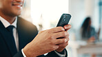 Businessman, hands and typing in office with phone, email notification or website for financial agency. Corporate, person and tech in workplace with text message, news or mobile app for social media.