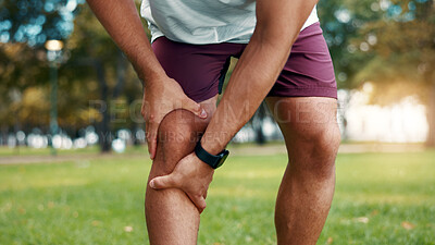 Buy stock photo Hands, knee pain and sore at park, fitness and athlete with sprain after exercise or muscle tension. Outdoor, training accident and person with workout injury in nature, inflammation and leg fracture