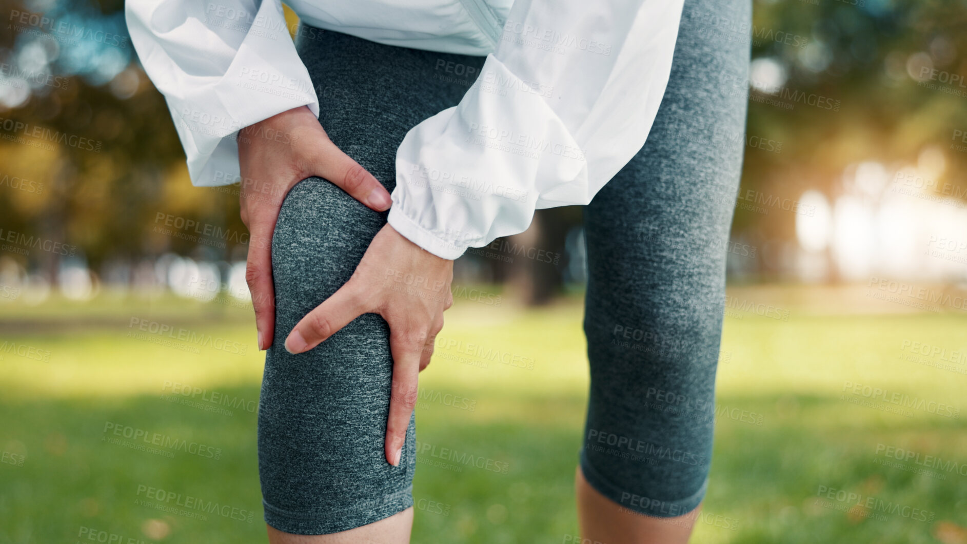 Buy stock photo Hands, knee pain and hurt at park, fitness and athlete with sprain after exercise or muscle tension. Outdoor, training accident and person with workout injury in nature, inflammation and leg fracture