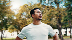 Tired, man and thinking of fitness at park, serious and rest after exercise and training in morning. Outdoor, athlete and person in nature post workout, reflection and cool down on break or low angle