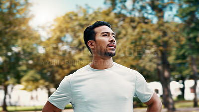 Buy stock photo Tired, man and thinking of fitness at park, serious and rest after exercise and training in morning. Outdoor, athlete and person in nature post workout, reflection and cool down on break or low angle