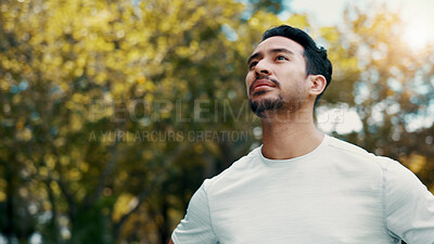 Buy stock photo Athlete, man and thinking of fitness at park, serious and rest after workout or training in morning. Outdoor, runner and person in nature post exercise, space and cool down on break and low angle