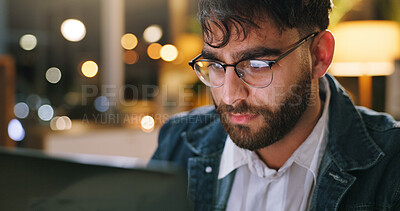 Buy stock photo Night, glasses or man in office with laptop, draft edit or fact checking in article review. Bokeh, specs or journalist in newsroom with technology, proofreading or industry research in overtime.