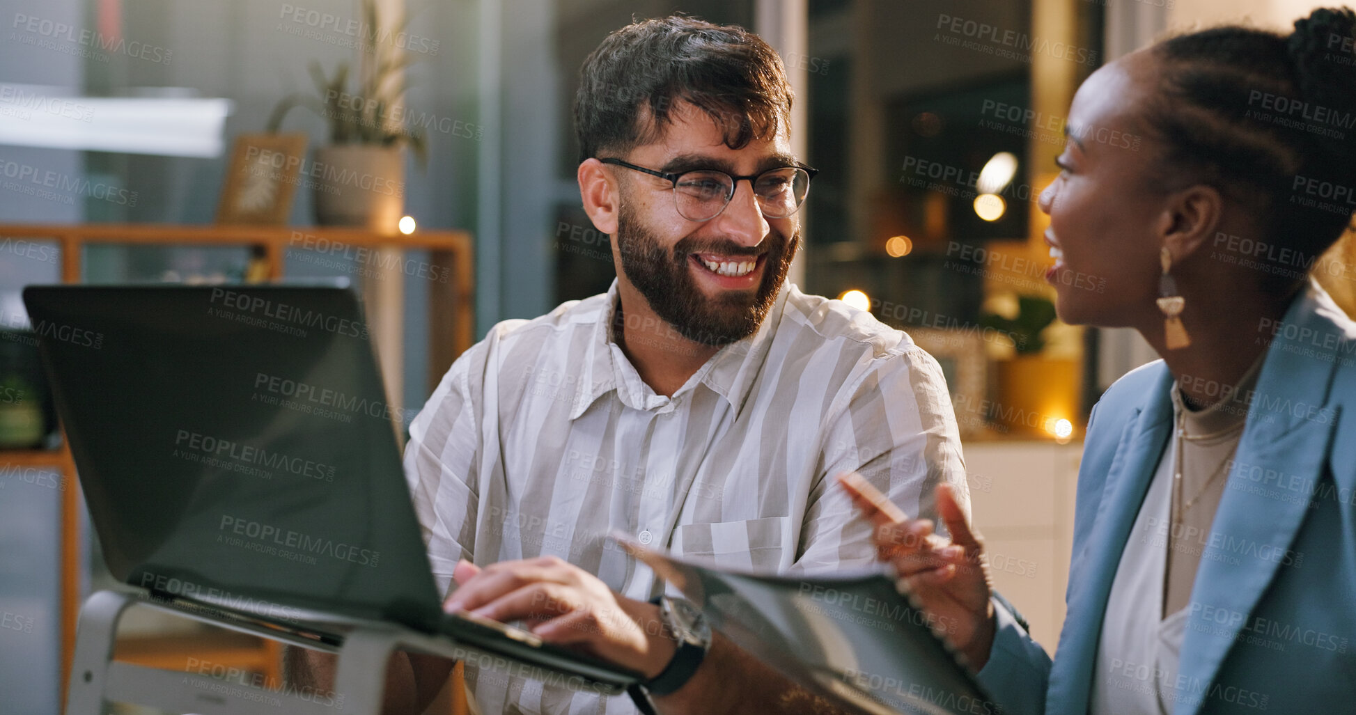 Buy stock photo Team, laughing and people with laptop in business, working late and journalist with article deadline. Newsroom, man and woman with smile for funny story, online or publishing with technology at night