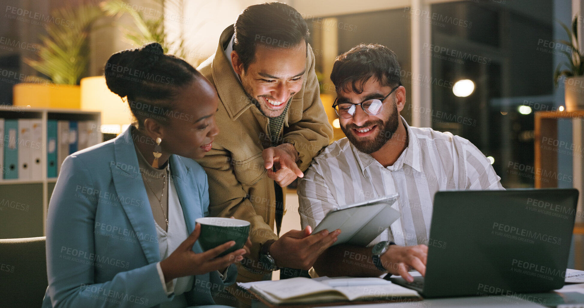 Buy stock photo Team, laughing and group with tablet in business, working late and journalist with article deadline. Newsroom, online and people with smile for funny story, pointing and reading with tech at night