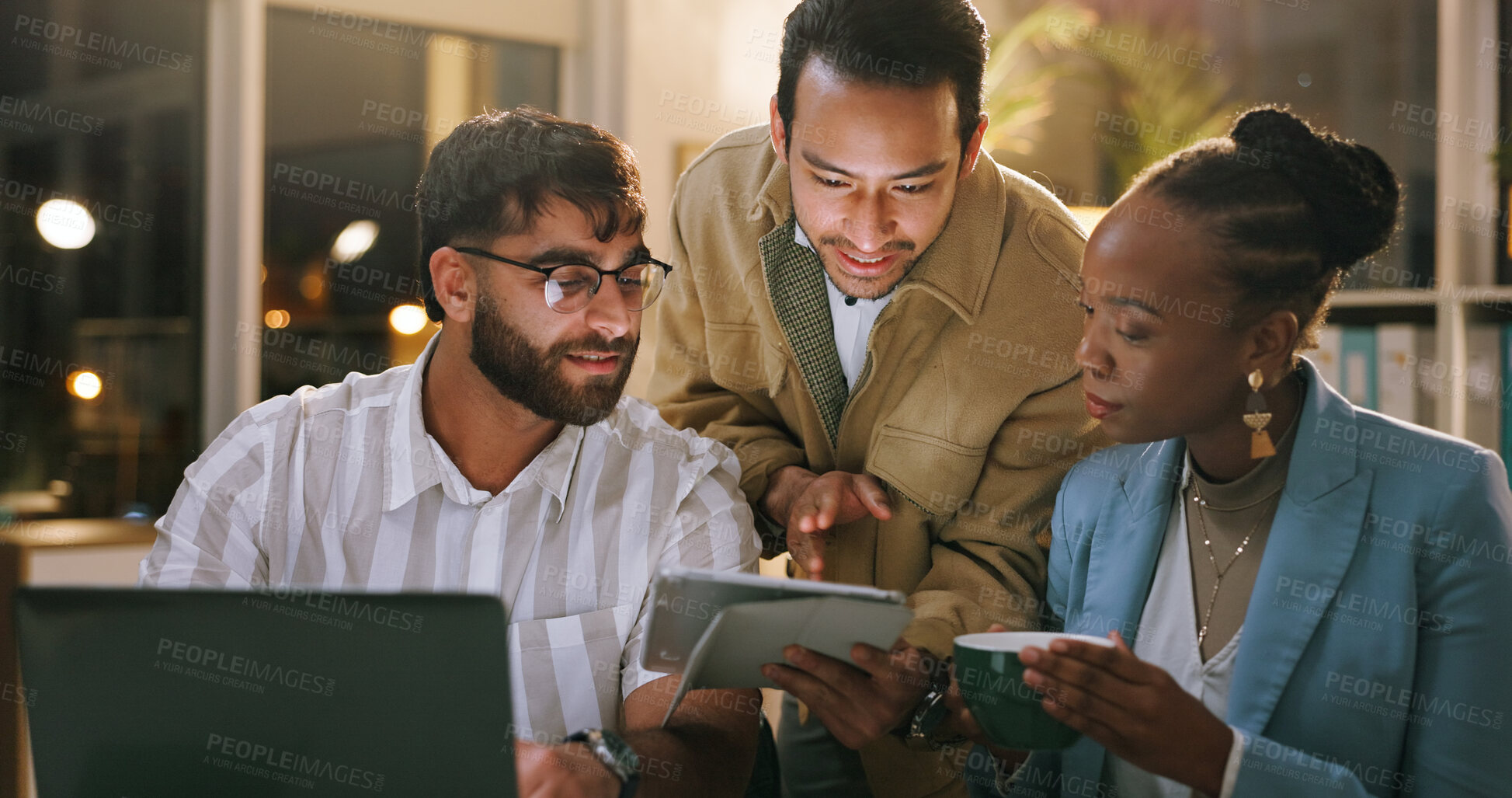 Buy stock photo Group, reading and teamwork with tablet in business, working late and reporter with article deadline. Newsroom, online and people with smile for funny story, pointing and creative with tech at night