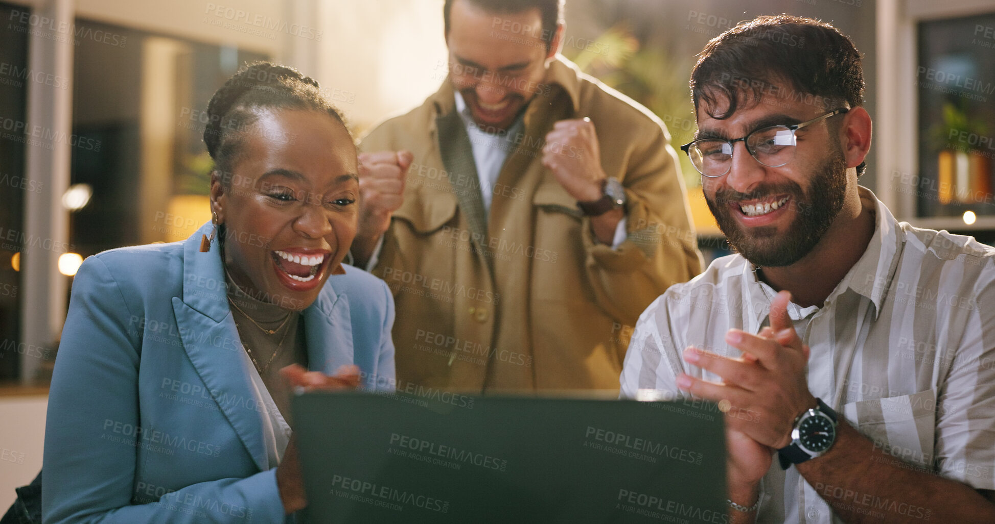 Buy stock photo Business people, laptop and team at startup for celebration, success or goals at night in office. Group, staff and happy with overtime, congratulations or applause for announcement at creative agency