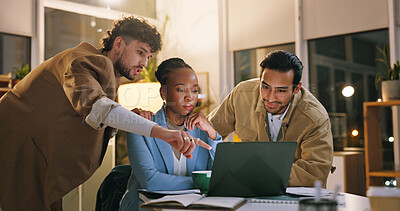 Buy stock photo Group, pointing and teamwork with laptop in business, working late or reporter with article deadline. Newsroom, online and people with smile for assignment, reading and creative with tech at night