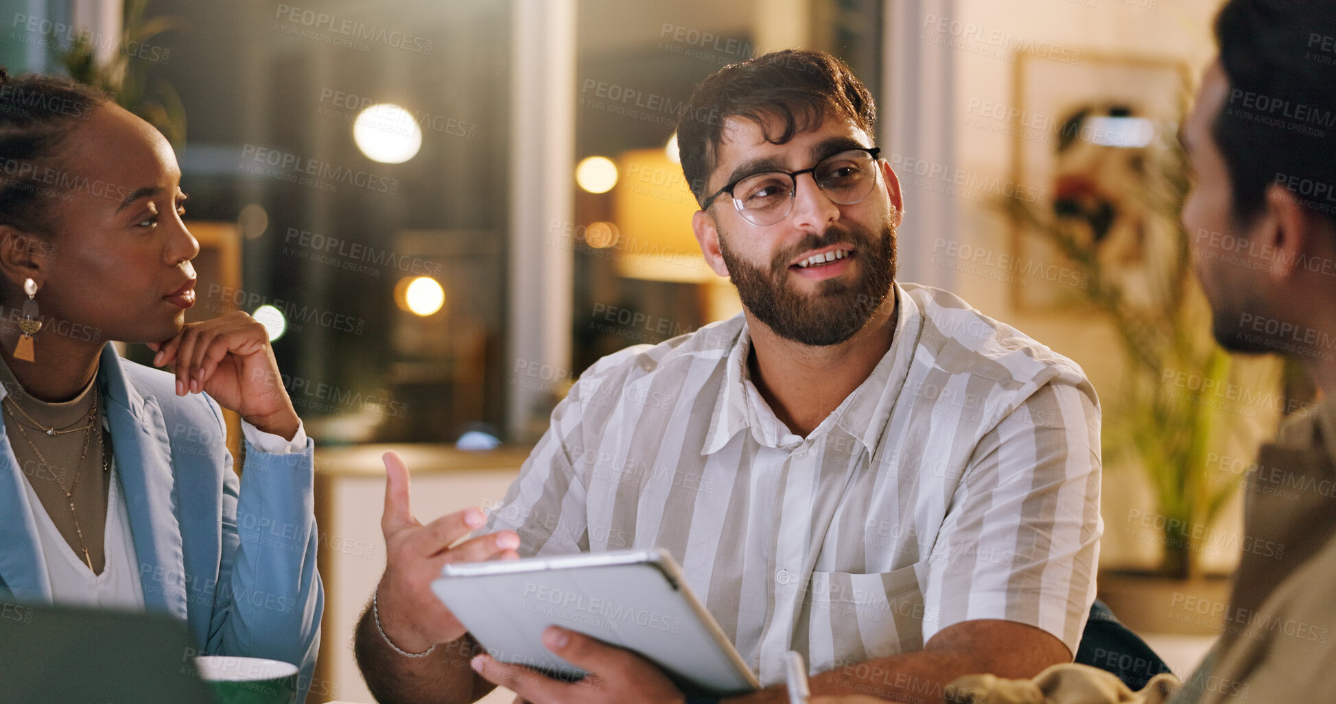 Buy stock photo Night, brainstorming or team in office with tablet, draft feedback or proposal of article idea. Collaboration, people or journalist in agency with tech, report planning or column insight in overtime.