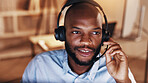 Black man, headset and callcenter at night for communication, contact us or customer service. Late shift, conversation and phone call for help desk assistance with male agent on mic in office