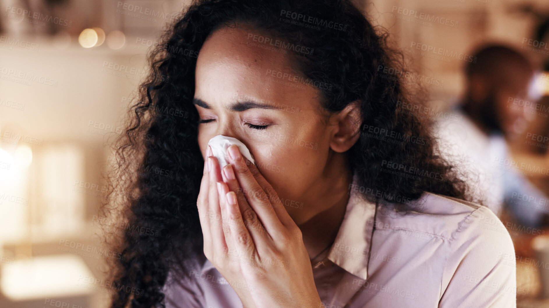 Buy stock photo Business, woman and blowing nose with tissue at night for influenza, cold or flu symptoms in office. Sick, female person or working late with allergy, sinus or toilet paper for fever in workplace