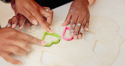 Buy stock photo Hands, mother and child with dough shapes for learning, culinary skills and bonding together. Person, kid and helping with cookie cutter, dessert pastry and teaching recipe for handmade snack in home
