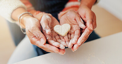 Buy stock photo Heart cookie, family or hands in home with baking, bonding or support in learning to cook. Above, parent or child with love shape dessert, healthy relationship or connection for cognitive development